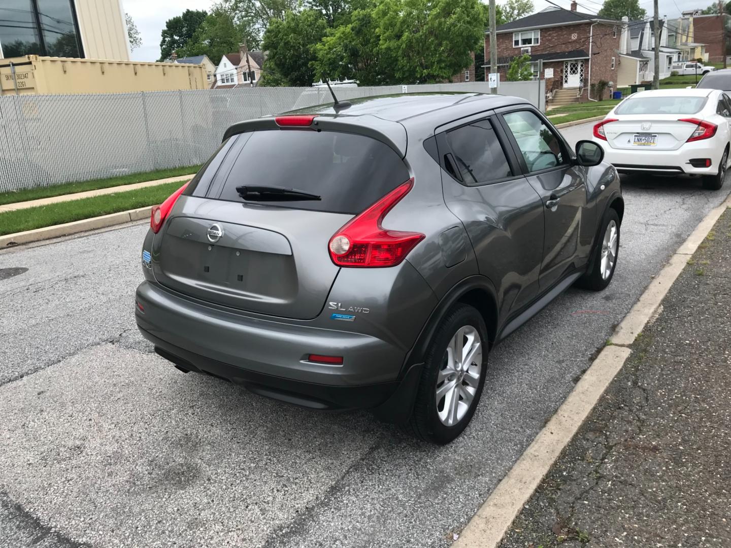 2013 Gray /Black Nissan Juke S (JN8AF5MV5DT) with an 1.6 V4 engine, Automatic transmission, located at 577 Chester Pike, Prospect Park, PA, 19076, (610) 237-1015, 39.886154, -75.302338 - Photo#4